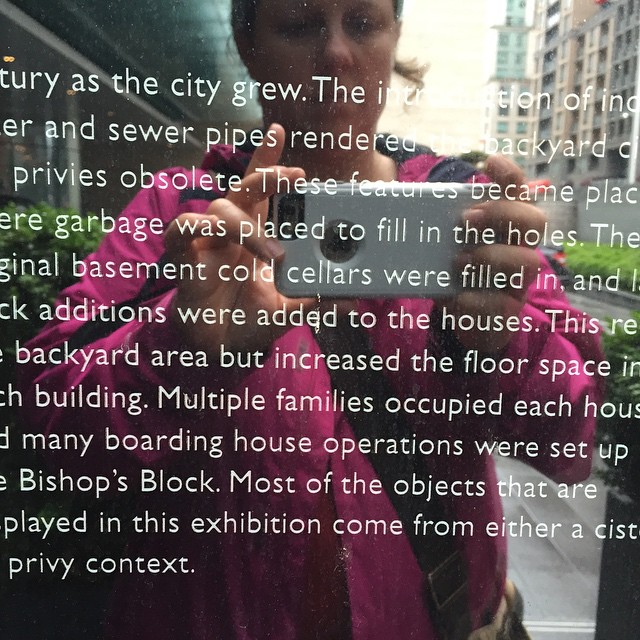 Hunt participant taking a photo of a historical plaque
